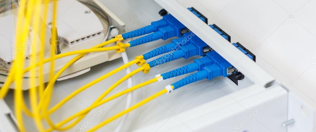 depositphotos_73071565-stock-photo-fiber-optic-cable-install